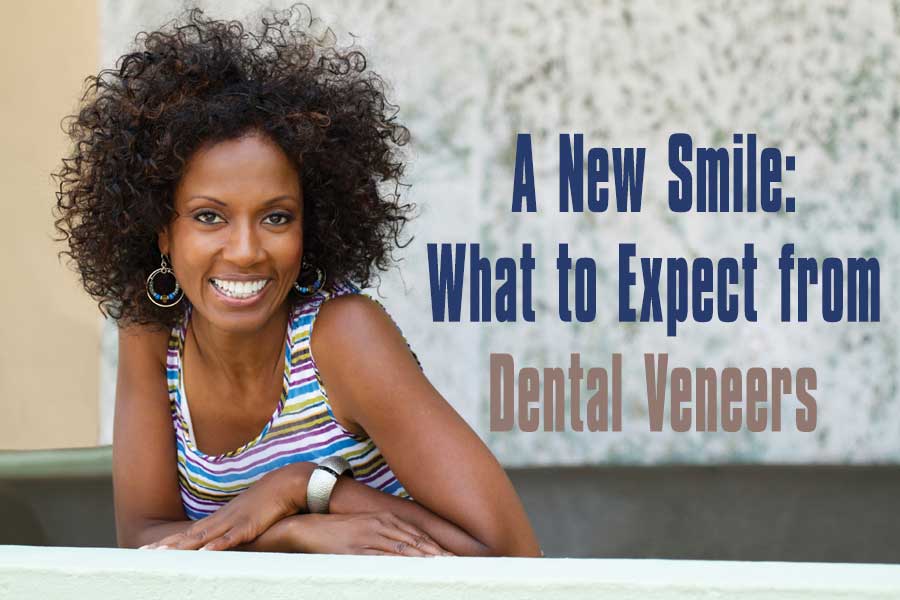 Woman smiling after getting dental veneers